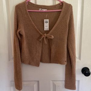Sweater. Tie in front. Hollister. Size Medium